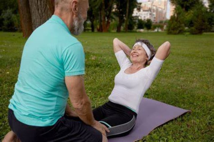 Abs: Enjoying a couple's workout, Joan put her rock hard abs on display in a sports bra and shorts